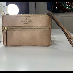 Rose gold Kate Spade wristlet. Lightly used